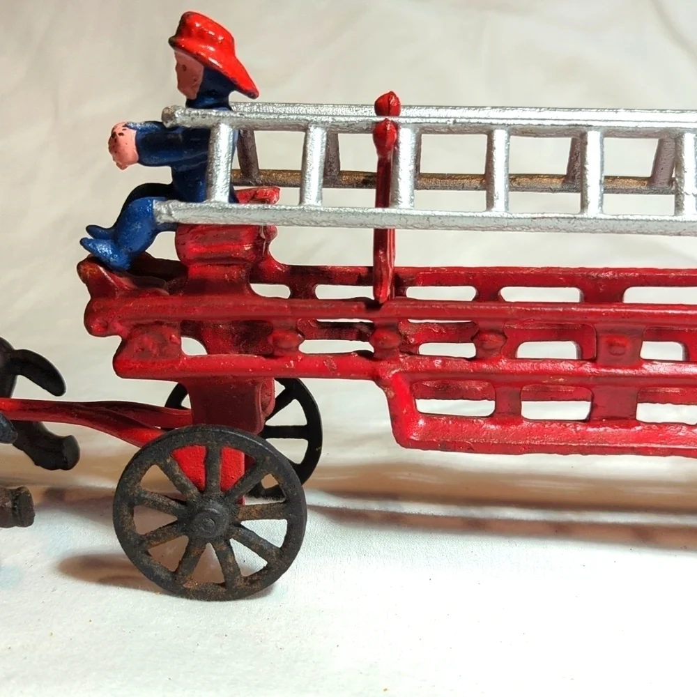 Vintage Cast Iron Horse Drawn Fire Truck Engine Wagon Toy w Fireman and Ladders